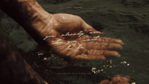 Wallpaper that shows a picture of hands in a sea filling them with water and the quote "you already are, who you want to be".